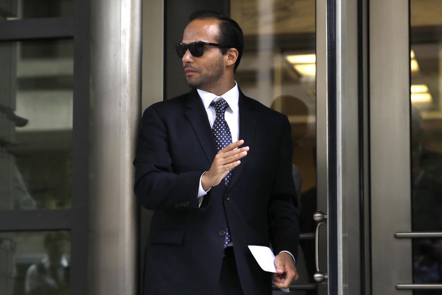 FILE - In this Friday, Sept. 7, 2018, file photo, former Donald Trump presidential campaign foreign policy adviser George Papadopoulos leaves federal court after he was sentenced to 14 days in prison, in Washington. Papadopoulos, who triggered the Russia investigation, is willing to testify before the Senate intelligence committee, Thomas Breen, his lawyer, said Wednesday, Sept. 12, 2018. (AP Photo/Jacquelyn Martin, File)