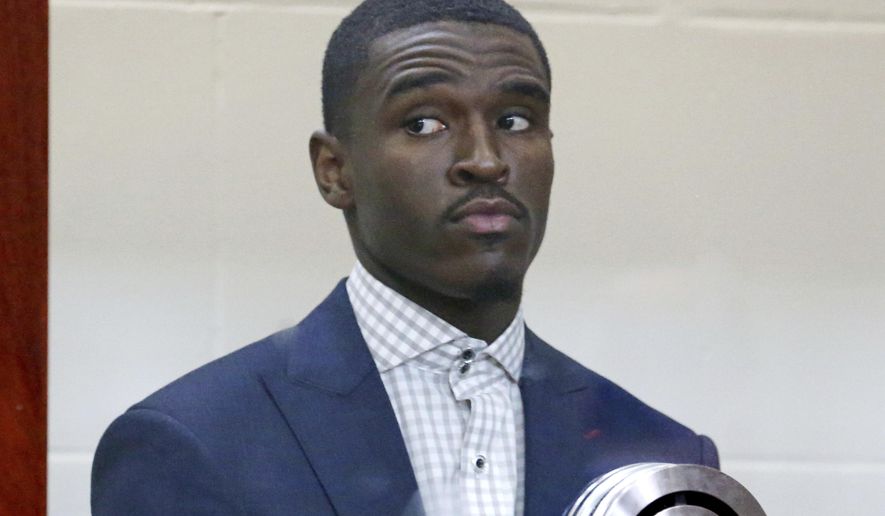 Boston Celtics guard Jabari Bird appears for his arraignment on domestic violence charges at Brighton Municipal Court, Thursday, Sept. 13, 2018 in Boston.  Prosecutors say Bird choked his girlfriend multiple times, kicked her and prevented her from leaving his apartment for hours last week before he collapsed in distress.(Angela Rowlings /The Boston Herald via AP, Pool)