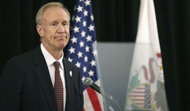 Illinois Gov. Bruce Rauner speaks Thursday, Sept. 13, 2018, at the Chicago Hilton, where he gave a speech outlining his campaign for re-election. (Chris Walker/Chicago Tribune via AP)