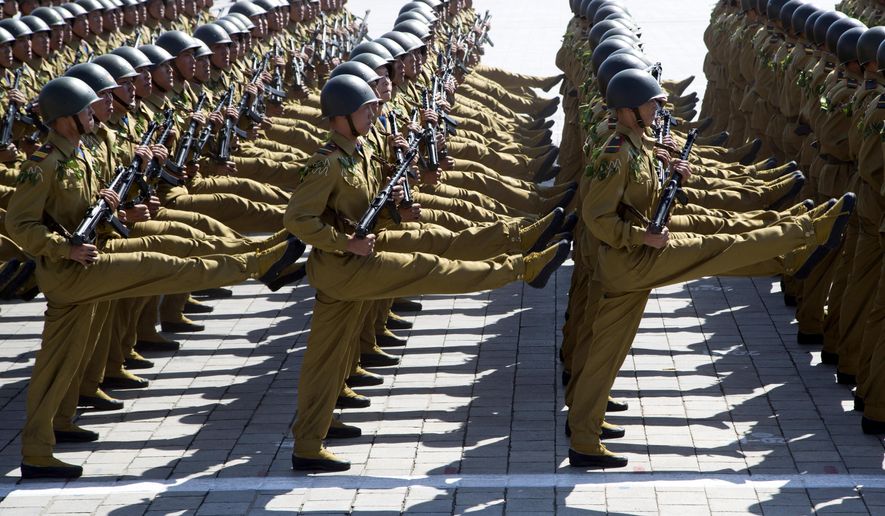 In this Sunday, Sept. 9, 2018, file photo, soldiers march past during a parade for the 70th anniversary of North Korea's founding day in Pyongyang, North Korea. North Korea staged a major military parade, huge rallies and will revive its iconic mass games on Sunday to mark its 70th anniversary as a nation. (AP Photo/Ng Han Guan, File)