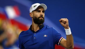 France&#39;s Benoit Paire reacts as he plays Spain&#39;s Pablo Carreno Busta during the Davis Cup semifinals France against Spain, Friday, Sept.14, 2018 in Lille, northern France. (AP Photo/Michel Spingler)