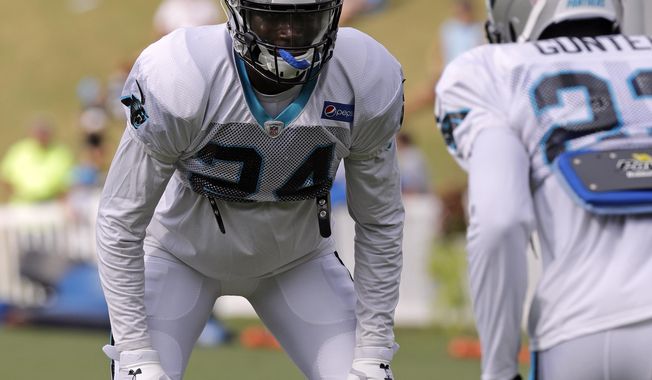 FILE - In this July 30, 2018, file photo, Carolina Panthers&#x27; James Bradberry (24) runs a drill during NFL football practice at the team&#x27;s training camp in Spartanburg, S.C. Bradberry has set his sights on becoming an All-Pro cornerback this season (AP Photo/Chuck Burton File)