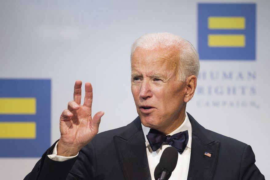 Former Vice President Joe Biden addresses the Human Rights Campaign National Dinner in Washington, D.C., Saturday, Sept. 15, 2018. (AP Photo/Cliff Owen)