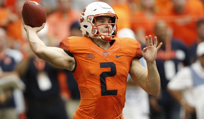 Syracuse's Eric Dungey passes in the first quarter of an NCAA college football game against Florida State in Syracuse, N.Y., Saturday, Sept. 15, 2018. (AP Photo/Nick Lisi)