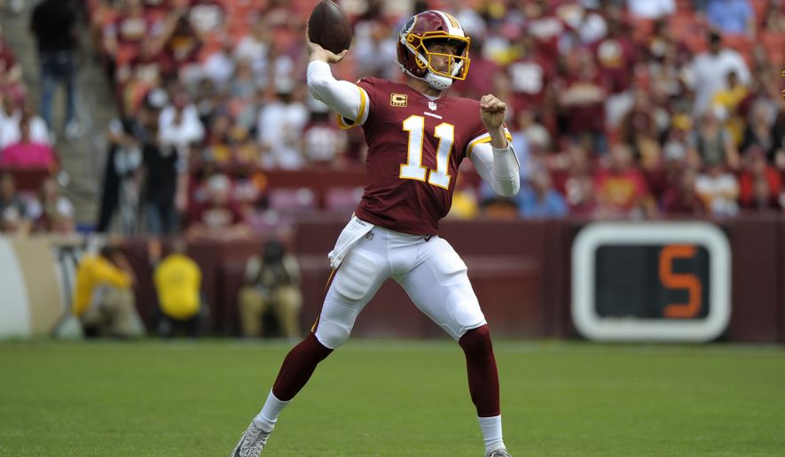 Washington Redskins quarterback Alex Smith throws a pass in the second half of an NFL football game against the Indianapolis Colts, Sunday, Sept. 16, 2018, in Landover, Md. (AP Photo/Mark Tenally)