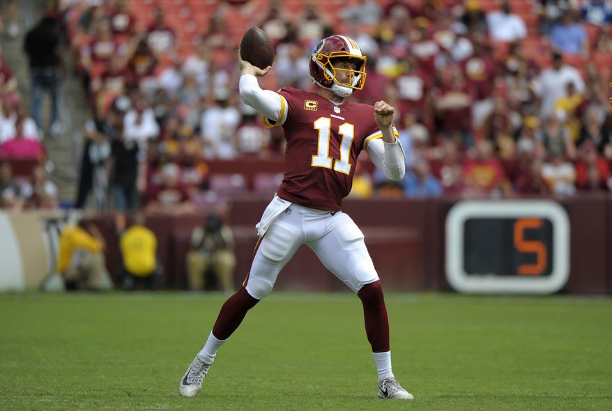 Washington Redskins quarterback Alex Smith throws a pass in the second half of an NFL football game against the Indianapolis Colts, Sunday, Sept. 16, 2018, in Landover, Md. (AP Photo/Mark Tenally)
