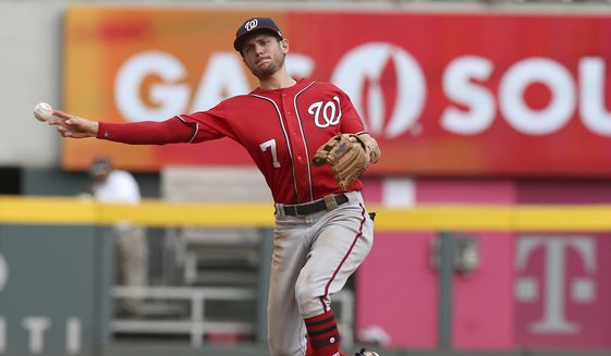 Washington Nationals shortstop Trea Turner throws out an Atlanta Braves batter in the ninth inning of a baseball game Sunday, Sept. 16, 2018. The Nationals defeated the Braves, 6-4. (AP Photo/Tami Chappell) ** FILE **