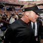 Oakland Raiders head coach Jon Gruden leaves the field after an NFL football game against the Denver Broncos, Sunday, Sept. 16, 2018, in Denver. The Broncos won 20-19. (AP Photo/David Zalubowski)