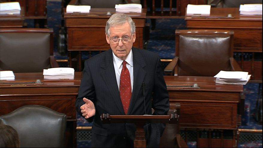 In this image from video, Senate Majority Leader Mitch McConnell of Ky., speaks on the flood of the U.S. Senate on Capitol Hill in Washington, Monday, Sept. 17, 2018. McConnell says Republicans will review the sexual assault allegation against Supreme Court nominee Brett Kavanaugh by the book with bipartisan interviews on the Judiciary Committee. (Senate Television via AP)