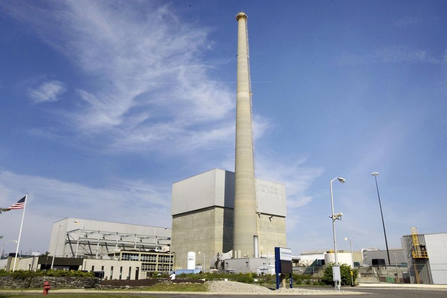 FILE - This 2010 file photo shows Exelon Corp.'s Oyster Creek Generating Station, a nuclear power plant in Lacey Township, N.J. America’s oldest nuclear power plant is shutting down Monday, Sept. 17, 2018. (Peter Ackerman/The Asbury Park Press via AP, File)