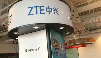 ZTE wasn’t spared this time from President Trump’s trade penalties, but a bipartisan group of senators says the Chinese technology giant is a bad actor and needs extra compliance scrutiny. (Associated Press)