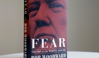 A copy of Bob Woodward&#39;s &quot;Fear&quot; is photographed Wednesday, Sept. 5, 2018, in New York. It&#39;s not clear whether President Donald Trump has much to fear from &quot;Fear&quot; itself. But the book of that name has set off a yes-no war between author Bob Woodward and the president, using all the assets they can muster. (AP Photo/Mark Lennihan)