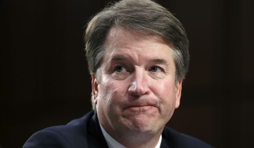 President Donald Trump's Supreme Court nominee, Brett Kavanaugh reacts as testifies after questioning by Sen. Cory Booker, D-N.J., before the Senate Judiciary Committee on Capitol Hill in Washington, Thursday, Sept. 6, 2018, for the third day of his confirmation hearing to replace retired Justice Anthony Kennedy. (AP Photo/Alex Brandon)