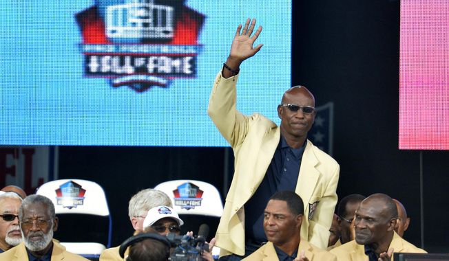 FILE - In this Aug. 2, 2014, file photo, enshrinee Eric Dickerson is introduced during the Pro Football Hall of Fame enshrinement ceremony, in Canton, Ohio. A group of Pro Football Hall of Famers is demanding health insurance coverage and a share of NFL revenues or else those former players will boycott the induction ceremonies. In a letter sent to NFL Commissioner Roger Goodell, NFLPA Executive Director DeMaurice Smith and Hall of Fame President David Baker — and obtained by The Associated Press — 21 Hall of Fame members cited themselves as &amp;quot;integral to the creation of the modern NFL, which in 2017 generated $14 billion in revenue.&amp;quot; Among the signees were Eric Dickerson. (AP Photo/David Richard, File)