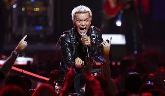 In this Sept. 23, 2016, file photo, Billy Idol performs at the 2016 iHeartRadio Music Festival — Day 1 held at T-Mobile Arena in Las Vegas. (Photo by John Salangsang/Invision/AP, File)