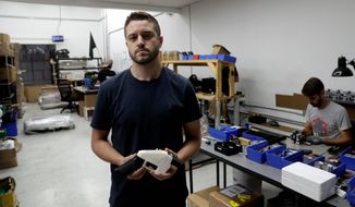 A judge has issued an arrest warrant for Cody Wilson. He faces a charge of having sex with a minor. Authorities are working to bring him back to Texas. (Associated Press)
