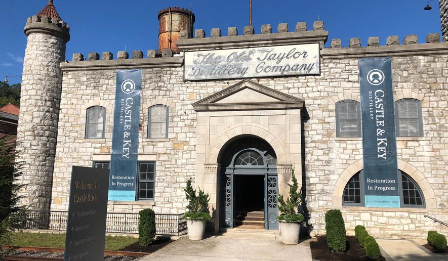 This Friday, Sept. 14, 2018 photo, shows the exterior of the Old Taylor distillery’s towering limestone castle which underwent a massive rehabilitation after decades of neglect and was renamed Castle &amp;amp; Key Distillery, in Millville, Ky. Four years after purchasing the property, owners Will Arvin and Wes Murry have poured millions into the project and resumed spirits production. On Wednesday, Sept. 19, the pair reopens the grounds to visitors. (AP Photo/Bruce Schreiner)