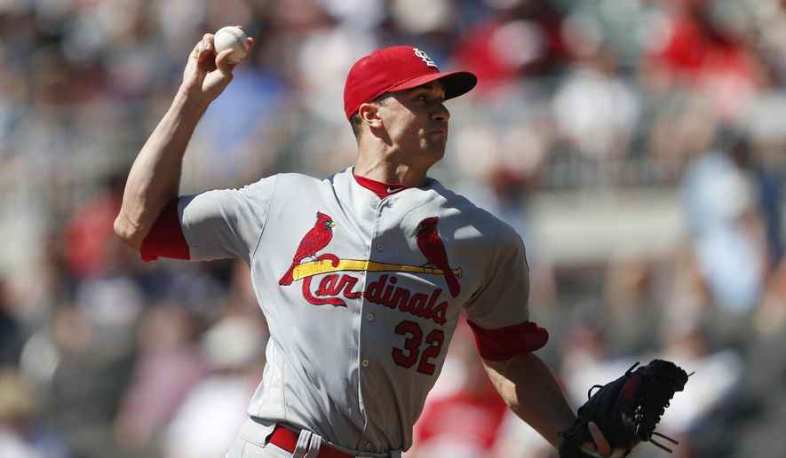 St. Louis Cardinals starting pitcher Jack Flaherty works against the Atlanta Braves in the first ...