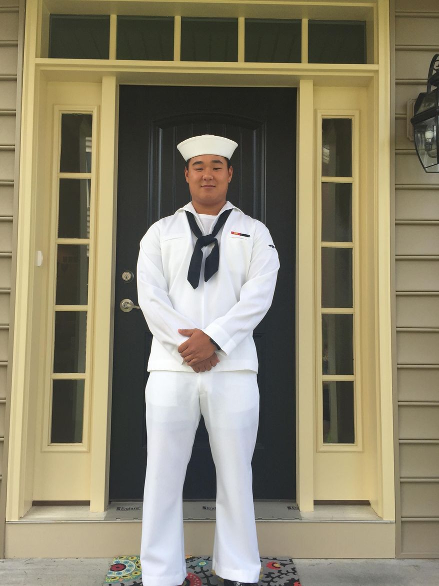 U.S. Navy Airman Apprentice Joseph Min Naglak poses in an undated photo provided by the U.S Navy on Wednesday Sept. 19, 2018. The Navy said the 21-year-old from New Jersey died Monday, Sept. 17, after being struck by a plane's propeller aboard the USS George H. W. Bush aircraft carrier while out to sea. (US Navy via AP)