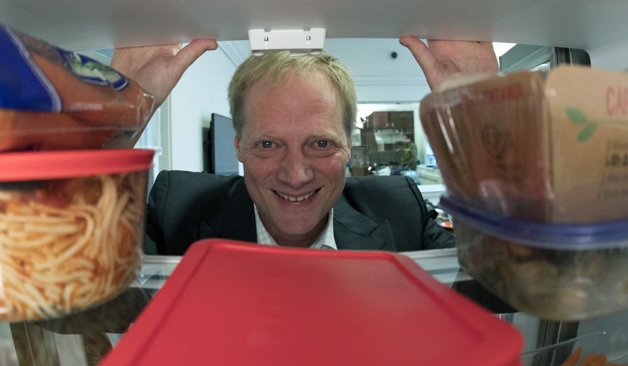 In this Dec. 6, 2016, photo, Brian Wansink poses for a photo in a food lab at Cornell University in Ithaca, N.Y. (Associated Press) **FILE**