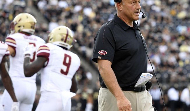 FILE - In this Thursday, Sept. 13, 2018, file photo, Boston College head coach Steve Addazio watches during the first half of an NCAA college football game against Wake Forest in Winston-Salem, N.C. The 23rd-ranked Eagles hit the road with a perfect record and their first ranking in a decade as they try to prevent Purdue from finding answers after a rugged start. (AP Photo/Woody Marshall, File)