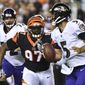 FILE - In this Sept. 13, 2018, file photo, Cincinnati Bengals defensive tackle Geno Atkins (97) pursues Baltimore Ravens quarterback Joe Flacco (5) before completing the sack during the first half of an NFL football game in Cincinnati. Atkins has looked super, getting three sacks and plenty of pressures. (AP Photo/Bryan Woolston, File)