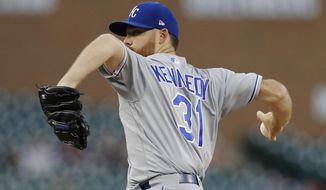 Kansas City Royals starting pitcher Ian Kennedy throws during the first inning of a baseball game against the Detroit Tigers, Friday, Sept. 21, 2018, in Detroit. (AP Photo/Carlos Osorio)