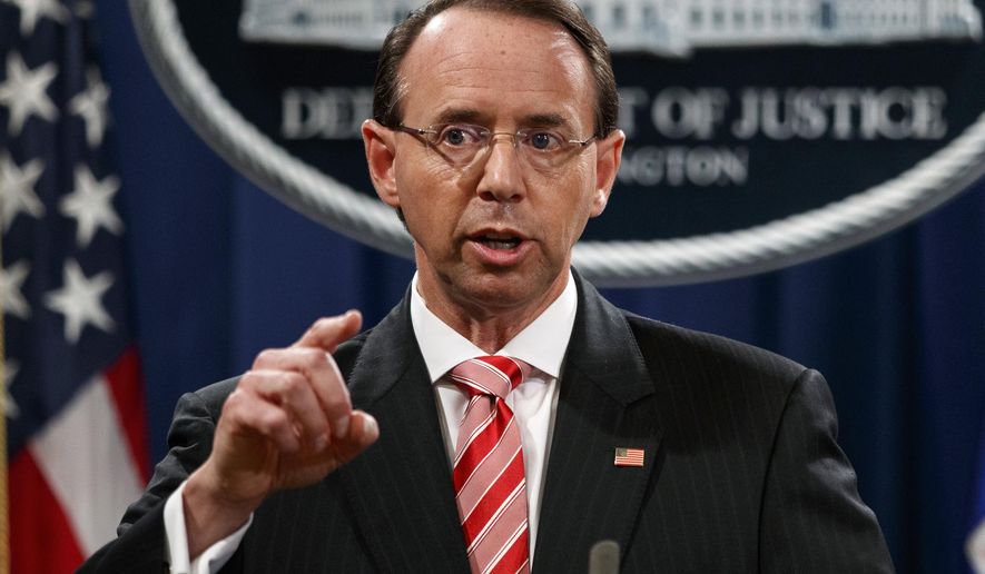 In this July 13, 2018, photo, Deputy Attorney General Rod Rosenstein speaks during a news conference at the Department of Justice in Washington. Rosenstein is denying a report in The New York Times that he suggested last year that he secretly record President Donald Trump in the White House to expose the chaos in the administration. Rosenstein says the story is “inaccurate and factually incorrect.” (Associated Press) **FILE**