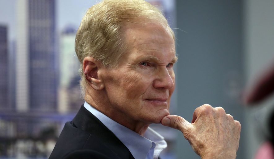 FILE- In this Aug. 6, 2018, file photo Sen. Bill Nelson, D-Fla.l istens during a roundtable discussion with education leaders from South Florida at the United Teachers of Dade headquarters in Miami.  Florida&#39;s 2018 midterm election is one of the most important in years. The governor&#39;s office and all three Cabinet seats are on the ballot; Republican Gov. Rick Scott is challenging Nelson; several congressional seats will be competitive; and Floridians will vote on several proposed constitutional amendments.  (AP Photo/Lynne Sladky, File)