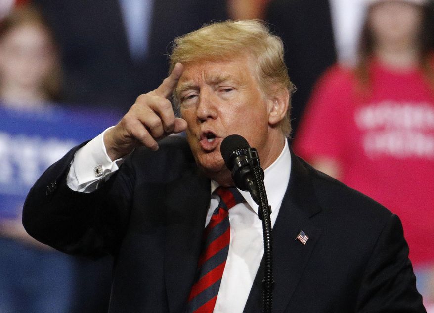 President Donald Trump addresses the crowd during a campaign rally Friday, Sept. 21, 2018, in Springfield, Mo. (AP Photo/Charlie Riedel)