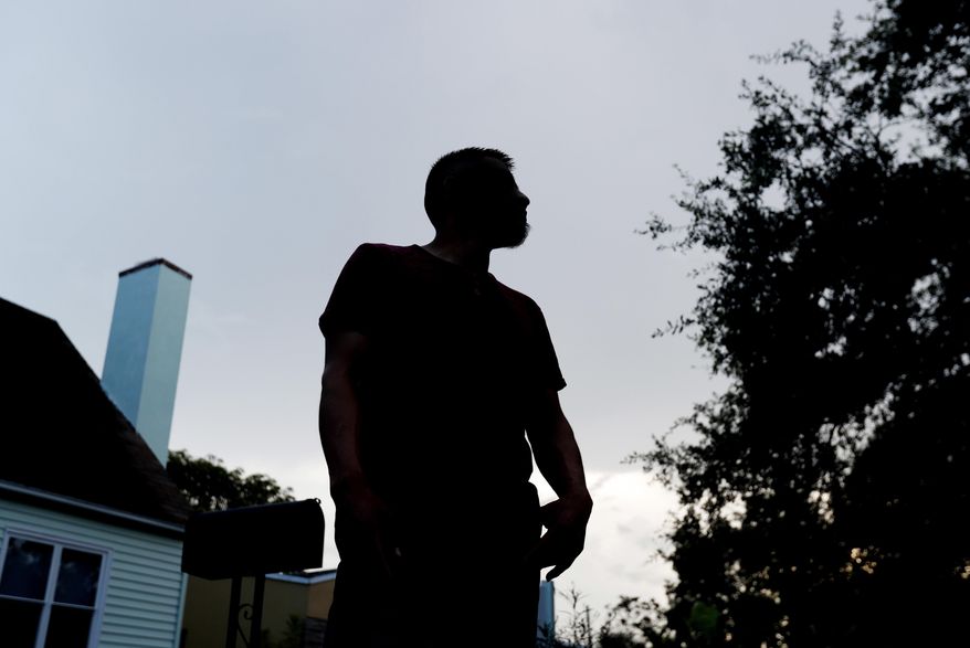 In this Friday, Sept. 14, 2018 photo, Adan, a 27-year-old Guatemalan living in south Florida, who did not wish to be further identified, poses for a photo near his home. Immigrant families hoping to reunite with children and teenagers who crossed the border alone are facing an intimidating system that includes submitting fingerprints by all adults in the household where a migrant child will live. Adan followed the process to gain custody of his 17-year-old sister in detention. Now, he wants to leave his apartment. "I feel I need to move to have a sense of security," said the landscaper about ICE knowing where he lives. (AP Photo/Wilfredo Lee)