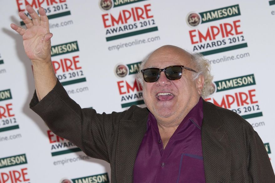 FILE - In this Sunday, March 25, 2012 file photo, Danny DeVito arrives for the Jameson Empire Awards at a central London venue. Actor Danny DeVito has been honored with a lifetime achievement award at Spain’s most prestigious film festival in the northern coastal city of San Sebastian on Saturday Sept. 22, 2018. (AP Photo/Jonathan Short, File)