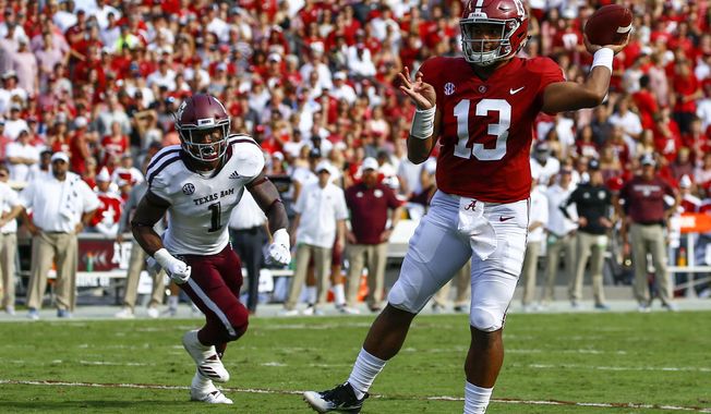 Alabama quarterback Tua Tagovailoa (13) throws a touchdown pass against Texas A&amp;amp;M during the first half of an NCAA college football game, Saturday, Sept. 22, 2018, in Tuscaloosa, Ala. (AP Photo/Butch Dill)