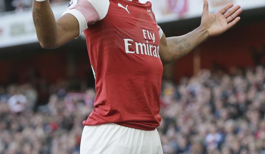 Arsenal&#39;s Pierre-Emerick Aubameyang celebrates after scoring his side&#39;s 2nd goal during an English Premier League soccer match between Arsenal and Everton at the Emirates Stadium in London, Sunday Sept. 23, 2018. (AP Photo/Tim Ireland)