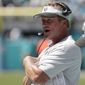 Oakland Raiders head coach Jon Gruden walks the sideline during the first half of an NFL football game against the Miami Dolphins, Sunday, Sept. 23, 2018, in Miami Gardens, Fla. (AP Photo/Lynne Sladky)