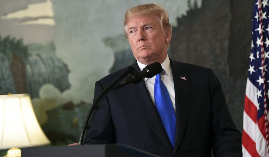 President Donald Trump arrives to speak about Iran from the Diplomatic Reception Room at the White House in Washington, Friday, Oct. 13, 2017. Trump says Iran is not living up to the &quot;spirit&quot; of the nuclear deal that it signed in 2015, and announced a new strategy in the speech. He says the administration will impose additional sanctions on the regime to block its financing of terrorism. (AP Photo/Susan Walsh)