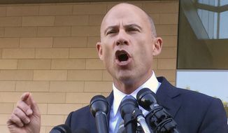 Michael Avenatti, attorney for porn actress Stormy Daniels, talks to reporters after a federal court hearing in Los Angeles, Monday, Sept. 24, 2018. (AP Photo/Amanda Lee Myers)