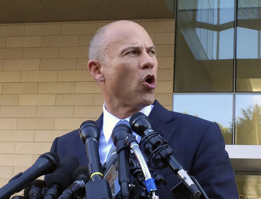 Michael Avenatti, attorney for porn actress Stormy Daniels, talks to reporters after a federal court hearing in Los Angeles, Monday, Sept. 24, 2018. (AP Photo/Amanda Lee Myers)