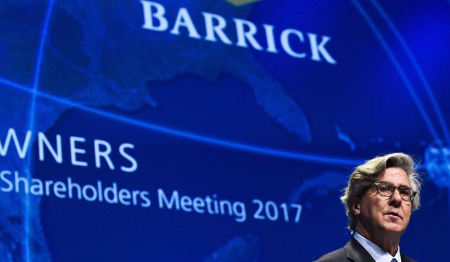 In this April 25, 2017 photo, Barrick Gold executive chairman of the board John L. Thornton speaks during the company&#x27;s annual general meeting in Toronto. Barrick Gold has agreed to buy Randgold Resources for $6.1 billion in stock to create the world&#x27;s largest gold miner, worth a combined $18 billion. (Nathan Denette/The Canadian Press via AP)