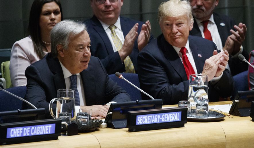 President Donald Trump listens as United Nations Secretary General Antonio Guterres speaks at the United Nations General Assembly, Monday, Sept. 24, 2018, at U.N. Headquarters. (AP Photo/Evan Vucci)
