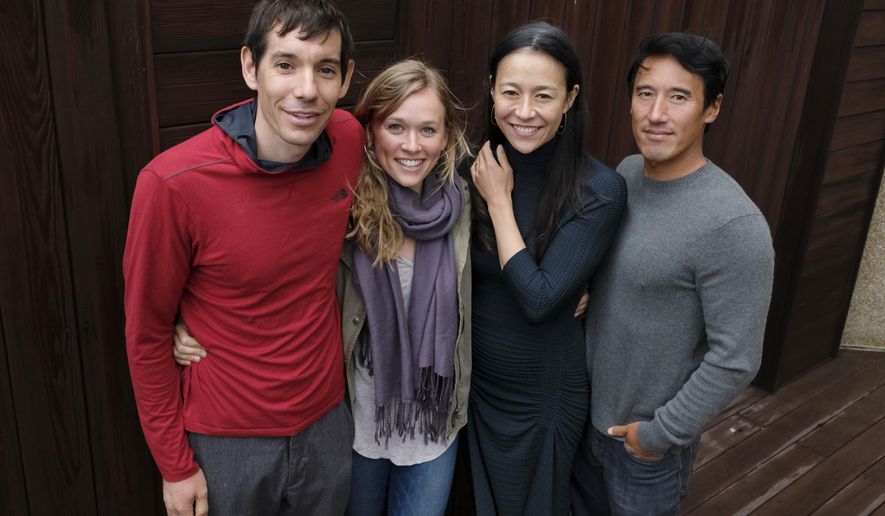 In this Sept. 10, 2018 photo, climbers Alex Honnold, from left, and Sanni McCandless, subjects of the documentary film &amp;quot;Free Solo,&amp;quot; pose with co-directors Elizabeth Chai Vasarhelyi and Jimmy Chin at the InterContinental Hotel during the Toronto International Film Festival in Toronto. (Photo by Chris Pizzello/Invision/AP)