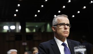 Acting FBI Director Andrew McCabe listens on Capitol Hill in Washington, Thursday, May 11, 2017, during the Senate Intelligence Committee hearing on major threats facing the U.S. (AP Photo/Jacquelyn Martin) ** FILE **