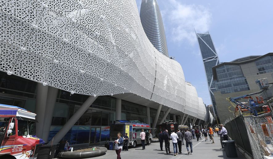 FILE - In this file photo taken Aug. 15, 2018, food trucks line up outside the new Transbay Transit Center in San Francisco. San Francisco officials shut down the city&#x27;s $2.2 billion transit terminal Tuesday, Sept. 25, 2018, after a crack was found in a steel beam. (AP Photo/Lorin Eleni Gill, File)