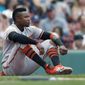 Baltimore Orioles&#x27; Tim Beckham sits behind home plate after being thrown out trying to score on a double by Joey Rickard during the third inning of the first game of a baseball double header against the Boston Red Sox in Boston, Wednesday, Sept. 26, 2018. (AP Photo/Michael Dwyer) ** FILE **