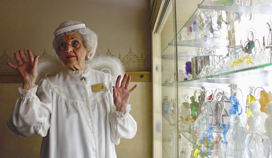 In this Sept. 13, 2018, photo, Joyce Berg talks about her angel collection at The Angel Museum in Beloit, Wis. The museum&#x27;s final day will be Saturday, Sept. 29, 2018. Berg and her late husband hold a Guinness World Record, with more than 13,000 angels. Berg said they are closing after 20 years due to insufficient funds, membership, corporate sponsors and volunteers. (AP Photo/Carrie Antlfinger)