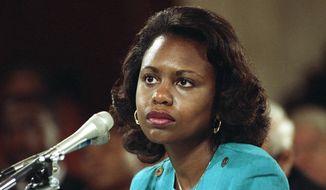 FILE - In this Oct. 11, 1991 file photo University of Oklahoma law professor Anita Hill testifies before the Senate Judiciary Committee on the nomination of Clarence Thomas to the Supreme Court on Capitol Hill in Washington. Hill testified that she was &amp;quot;embarrassed and humiliated&amp;quot; by unwanted, sexually explicit comments made by Thomas when she worked for him a decade ago. The Thomas-Hill hearings riveted Americans, and the same is expected for the Kavanaugh-Ford hearing on Thursday, Sept. 27, 2018. (AP Photo, File)