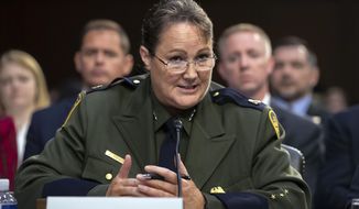 FILE - In this July 31, 2018, file photo, then-Customs and Border Protection U.S. Border Patrol Acting Chief Carla Provost takes questions as the Senate Judiciary Committee holds a hearing on the Trump administration&#39;s policies on immigration enforcement and family reunification efforts, on Capitol Hill in Washington. For the first time in the 94-year history of the U.S. Border Patrol, a woman is in charge. Provost was named to the position in August 2018 after serving as acting chief since April 2017 (AP Photo/J. Scott Applewhite, File)