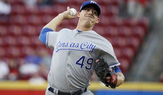 Kansas City Royals starting pitcher Heath Fillmyer throws during the first inning of the team&#39;s baseball game against the Cincinnati Reds, Wednesday, Sept. 26, 2018, in Cincinnati. (AP Photo/John Minchillo)