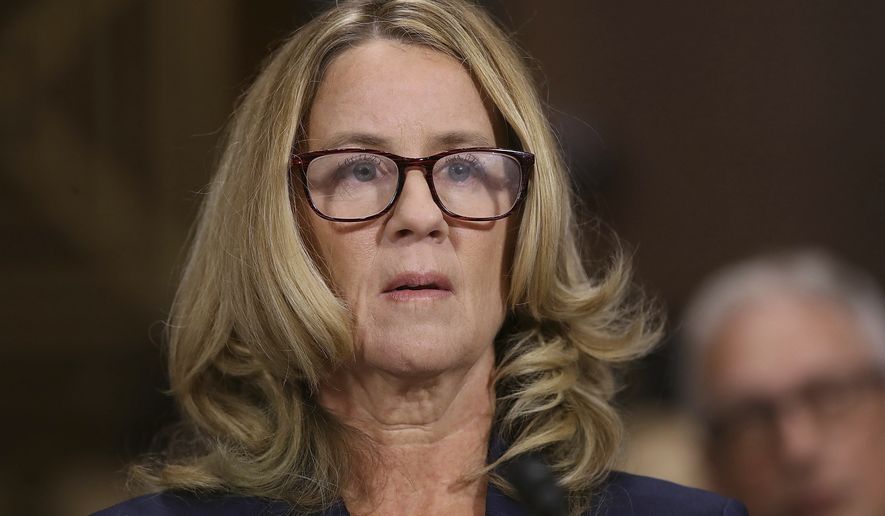 Christine Blasey Ford arrives to testify before the Senate Judiciary Committee on Capitol Hill in Washington, Thursday, Sept. 27, 2018. (Win McNamee/Pool Image via AP)