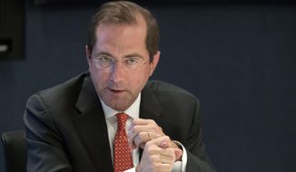In this Sept. 12, 2018, file photo, Health &amp;amp; Human Services Secretary Alex Azar speaks during an interview with The Associated Press in New York. Azar said premiums for a popular type of health plan under the Affordable Care Act will edge downward next year. Speaking in Nashville on Thursday, Sept. 26, Azar said premiums for a popular type of “silver” plan will drop by 2 percent in the 39 states served by the federal HealthCare.gov website. The number of marketplace insurers will grow for the first time since 2015. (AP Photo/Mary Altaffer, File)